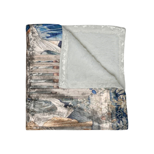 A plush velvet blanket with a geometric William Morris & Co pattern in a mix of gray, blue, and green colours, laid out flat.