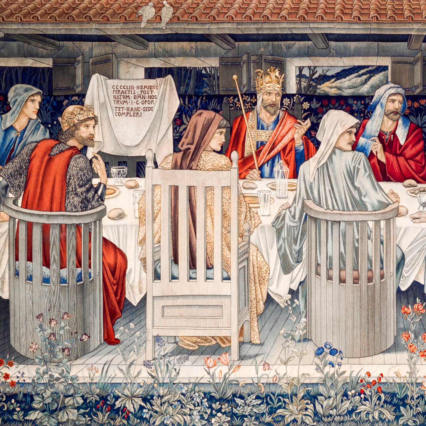 A plush velvet blanket with a geometric William Morris & Co pattern in a mix of gray, blue, and green colours, laid out flat.