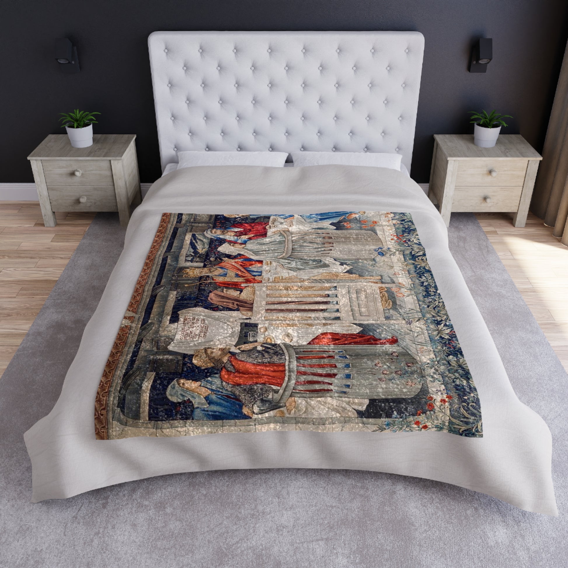 A plush velvet blanket with a geometric William Morris & Co pattern in a mix of gray, blue, and green colours, laid out flat.