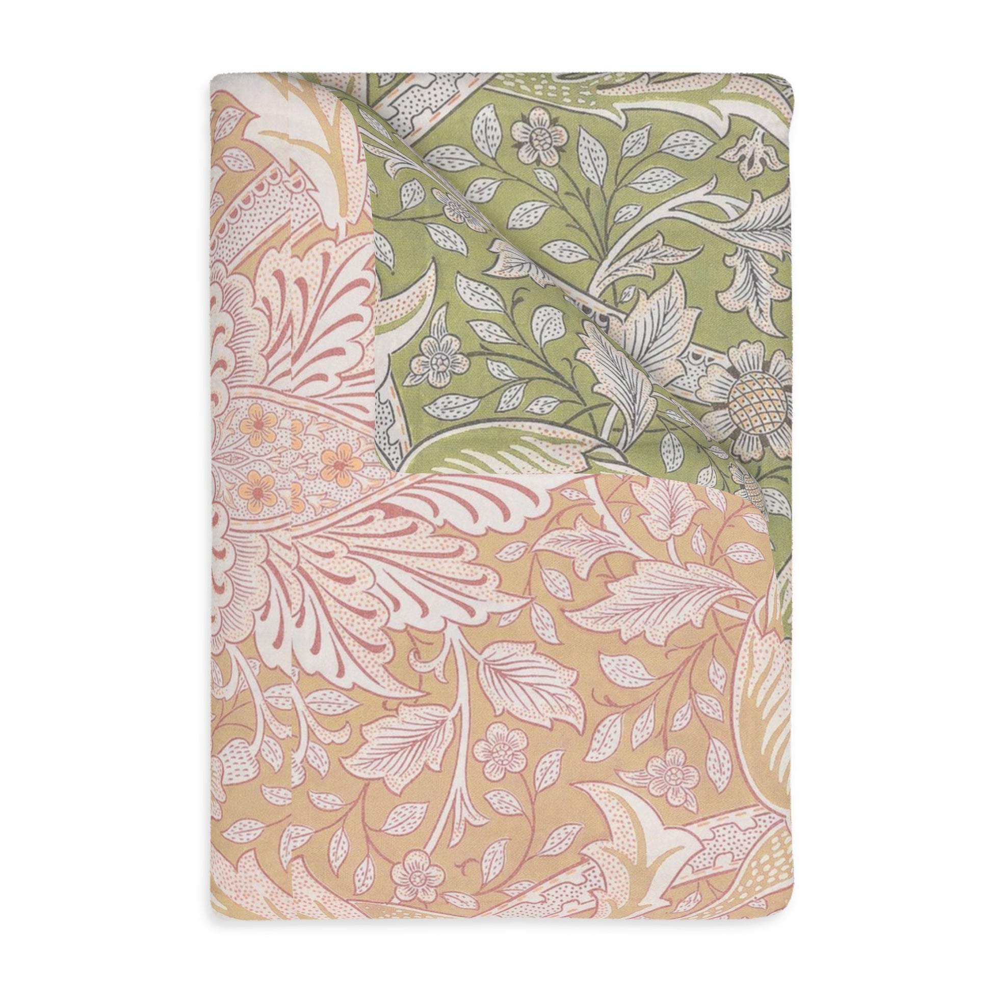 A luxury velveteen minky blanket with a two-sided print featuring floral and leaf designs in green, pink, and beige tones.