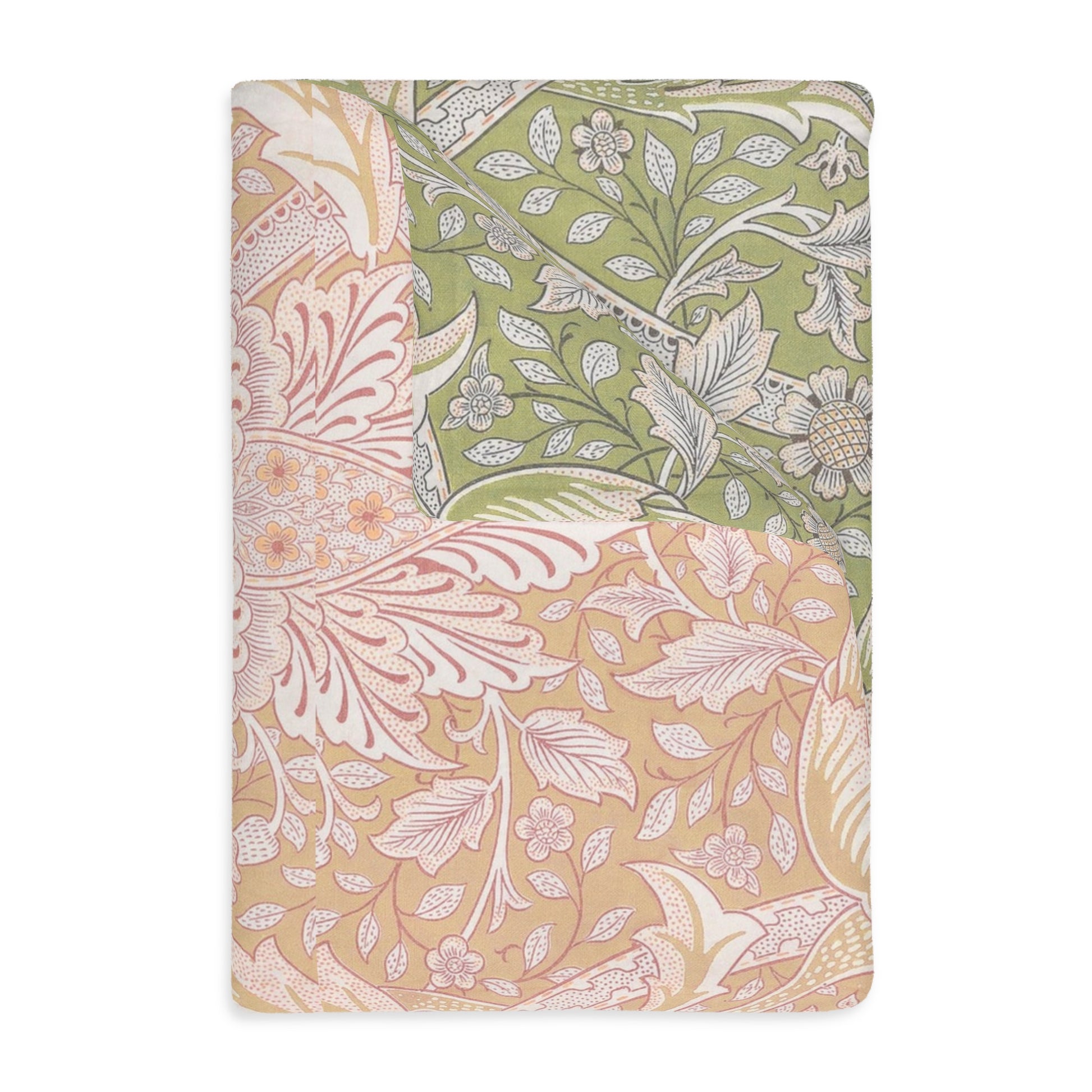 A luxury velveteen minky blanket with a two-sided print featuring William Morris & Co floral and leaf designs in green, pink, and beige tones.