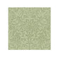Green leafy pattern on a light green background