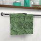 A green floral patterned washcloth inspired by William Morris' Acanthus Collection.
