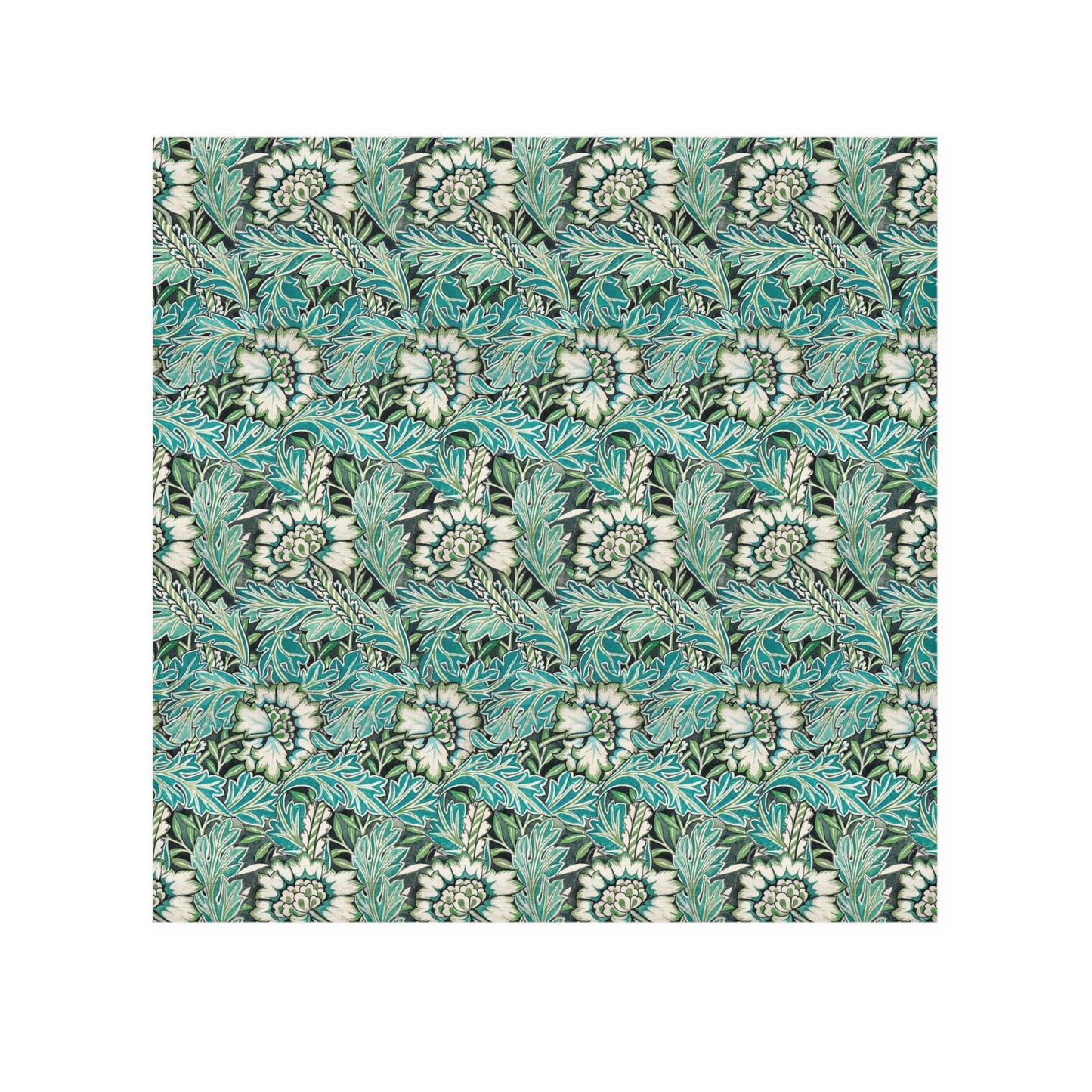 A white washcloth with a floral pattern inspired by William Morris, featuring green and blue colours.