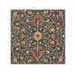 Decorative wshcloth with intricate floral pattern on a blue background