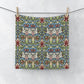 A multicolored floral patterned washcloth inspired by William Morris' Snakeshead Collection.
