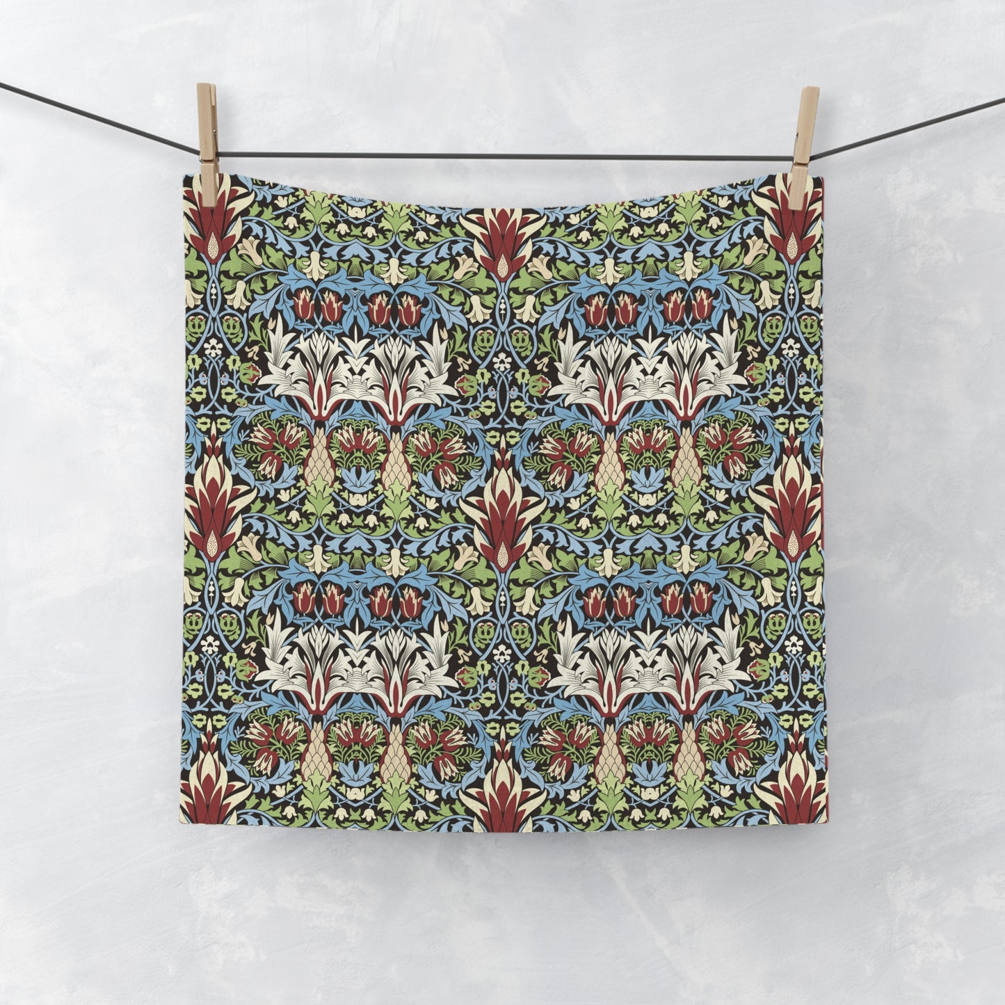 A multicolored floral patterned washcloth inspired by William Morris' Snakeshead Collection.