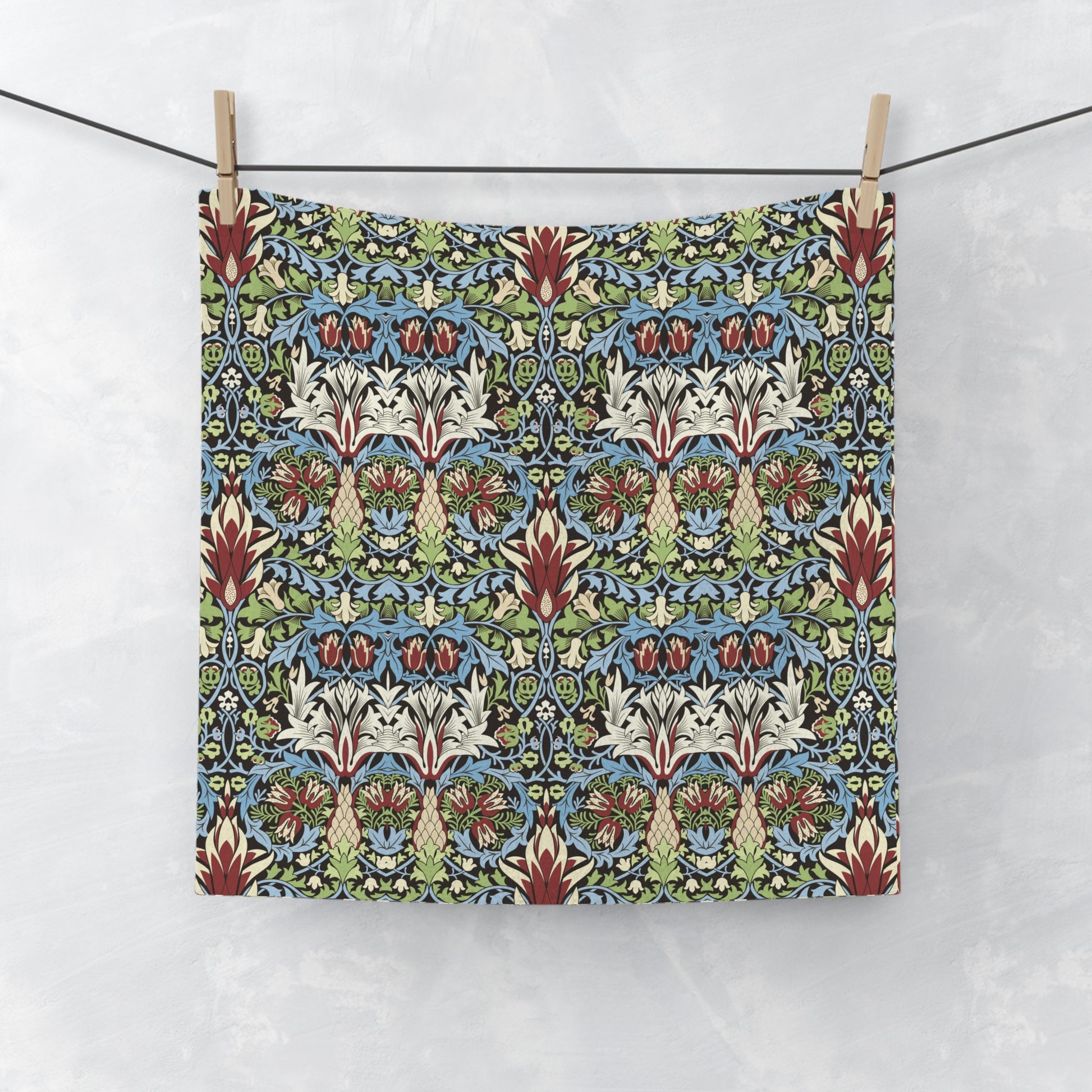 A multicolored floral patterned washcloth inspired by William Morris' Snakeshead Collection.