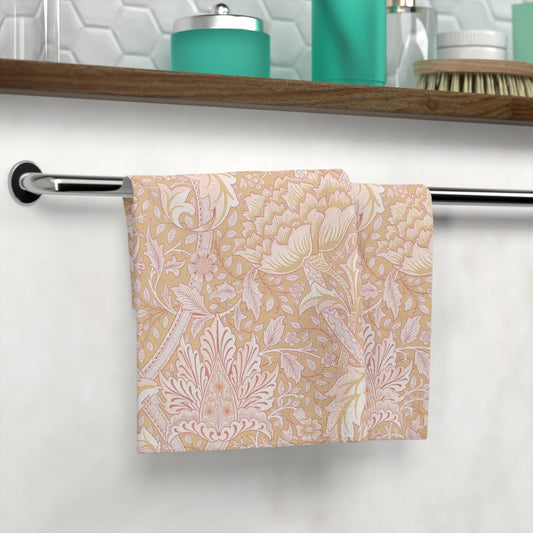 Patterned towel hanging on a rack in a bathroom setting