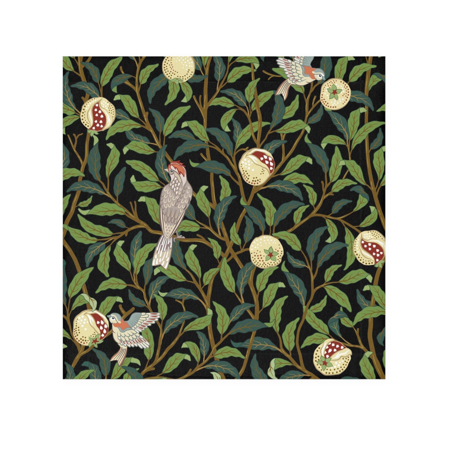 A white washcloth with a floral pattern featuring birds and pomegranates, inspired by the William Morris design.