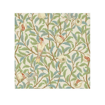 A white washcloth with a floral pattern inspired by William Morris, featuring birds and pomegranate designs on a parchment background.