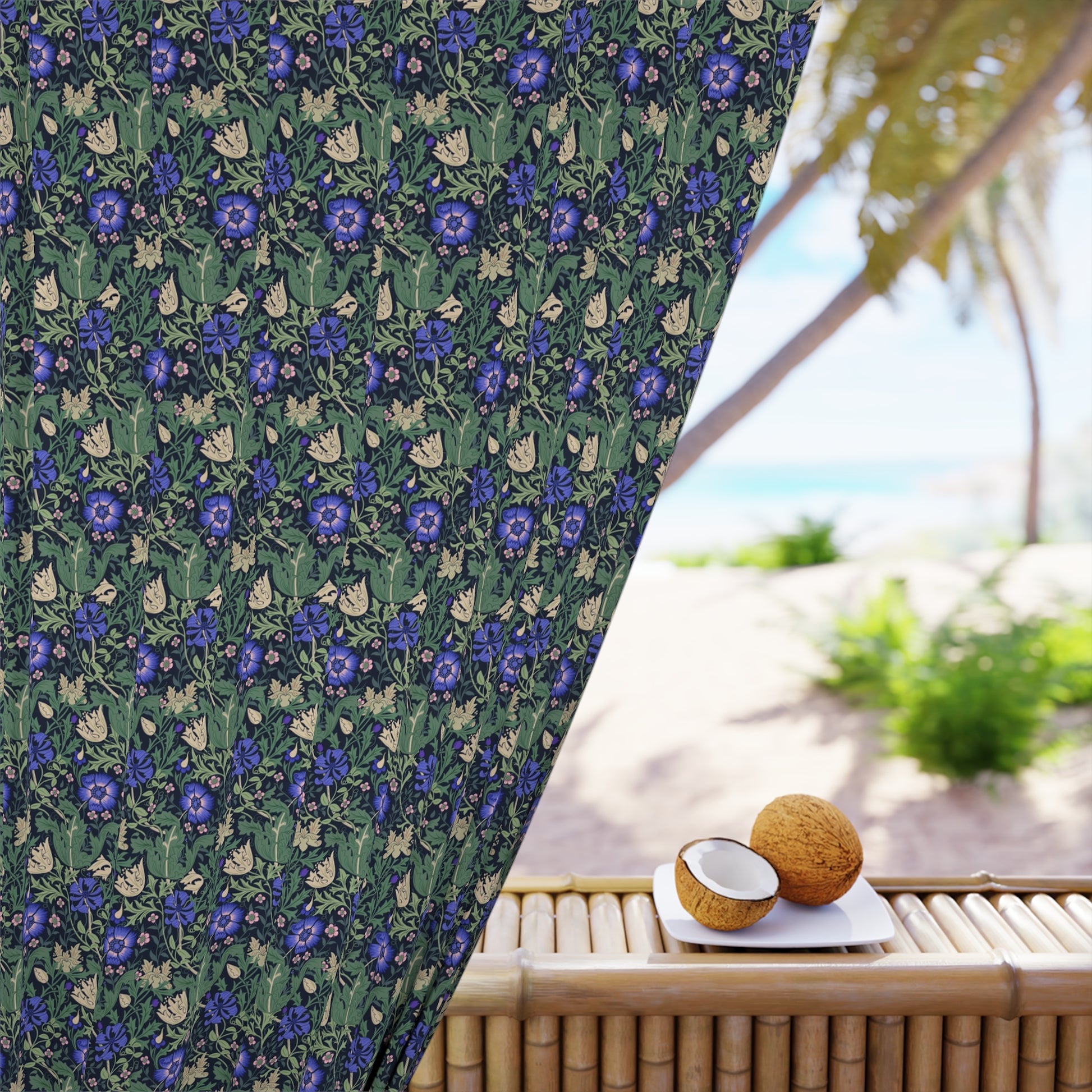 Floral patterned curtain with a beach view in the background