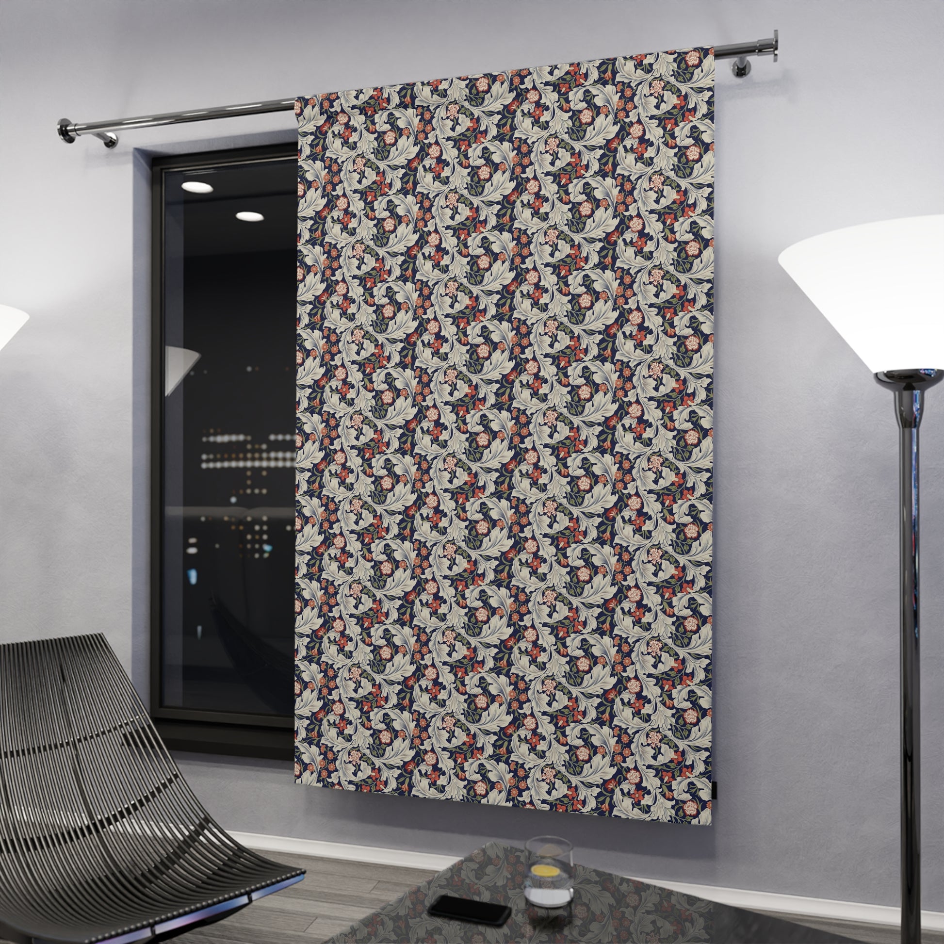 Patterned curtain hanging on a rod in a room with a modern interior design.