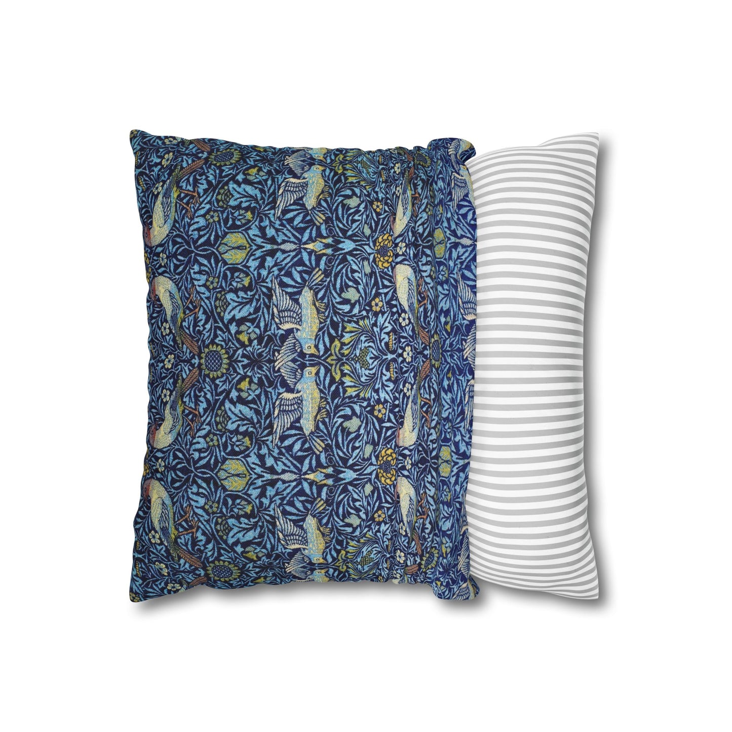 Two pillows, one with a blue floral pattern and the other with white stripes, on a white background.