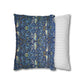 Two pillows, one with a blue floral pattern and the other with a white and gray striped pattern, on a white background.