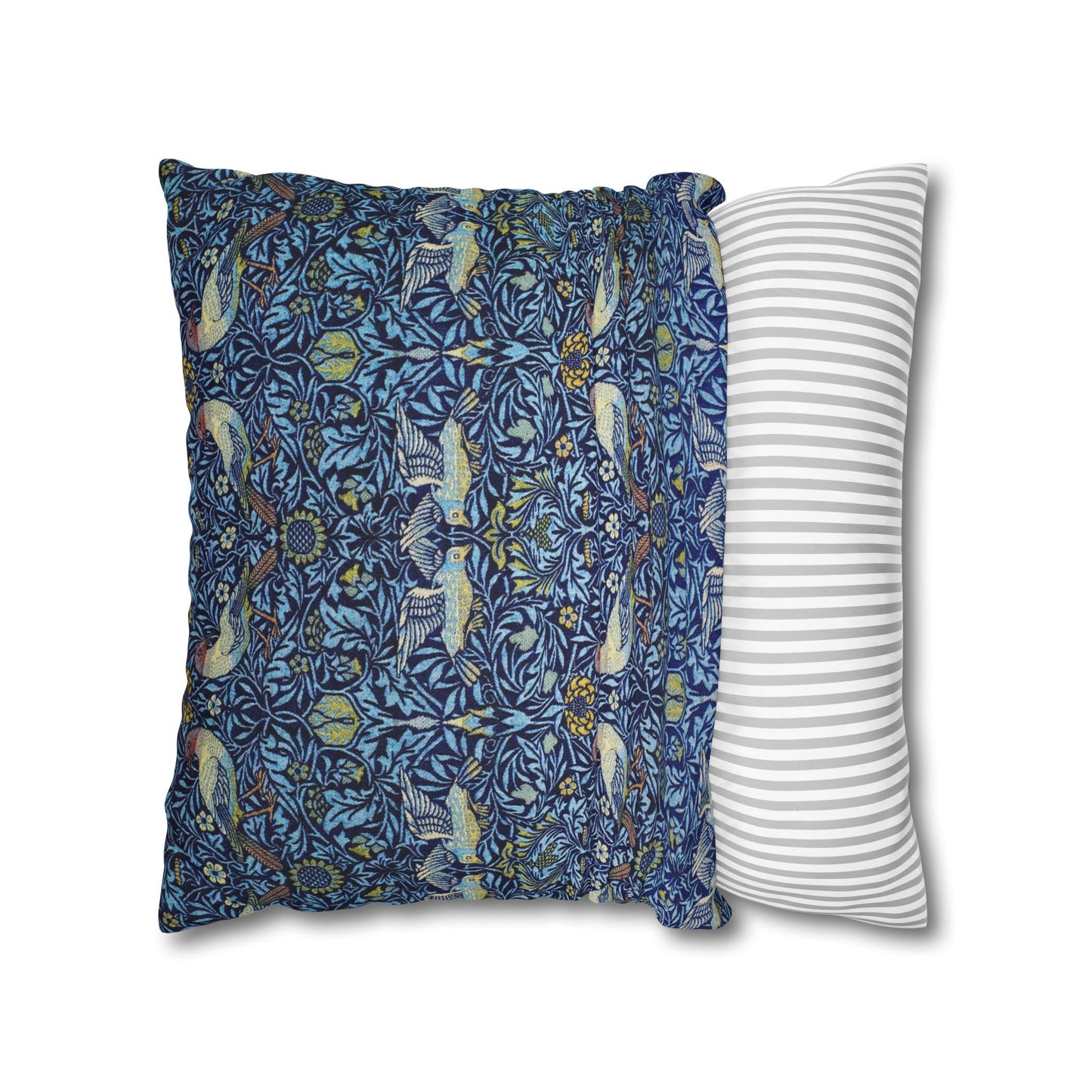 Two pillows, one with a blue floral pattern and the other with a white and gray striped pattern, on a white background.