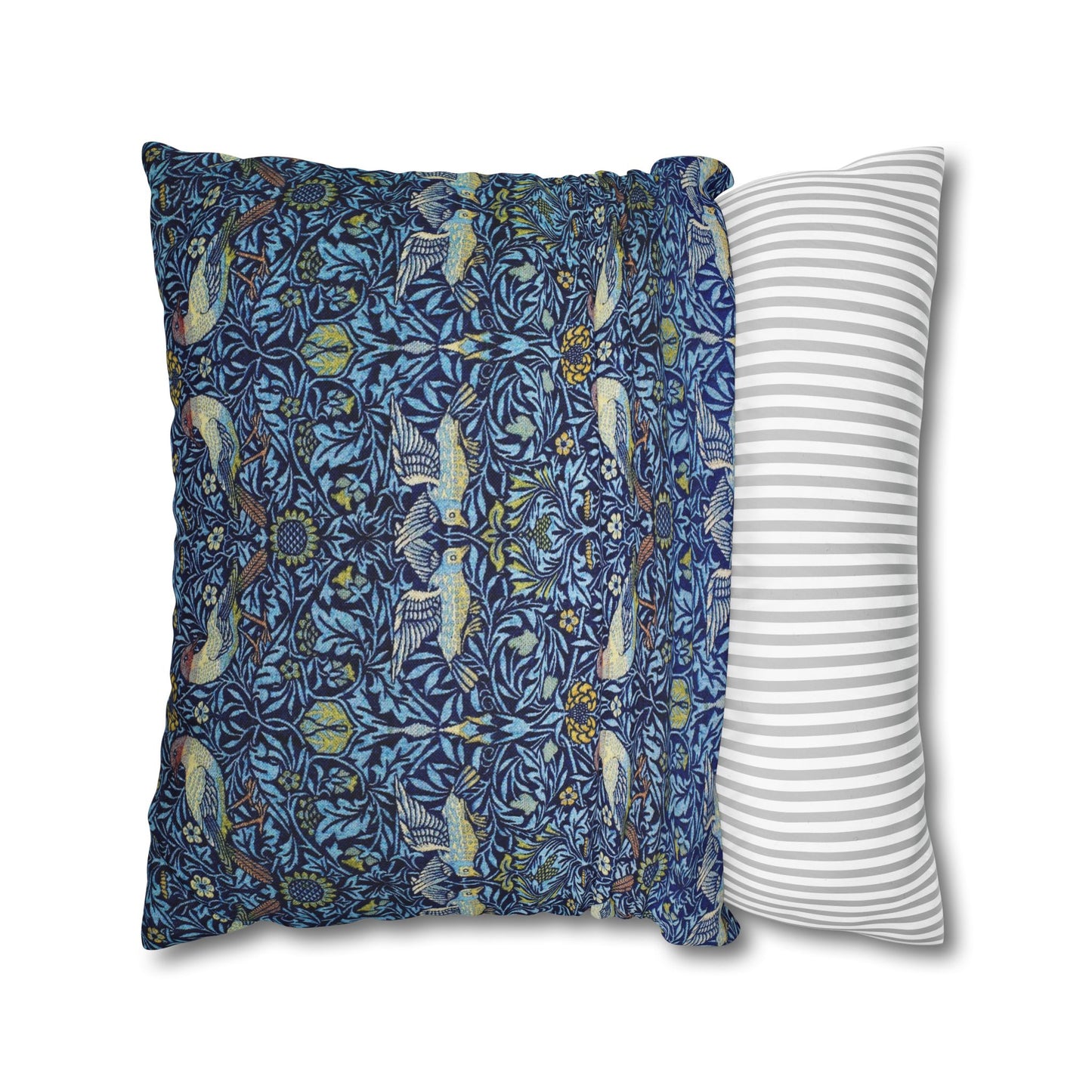 Two pillows, one with a blue floral pattern and the other with a white stripe pattern, on a white background.