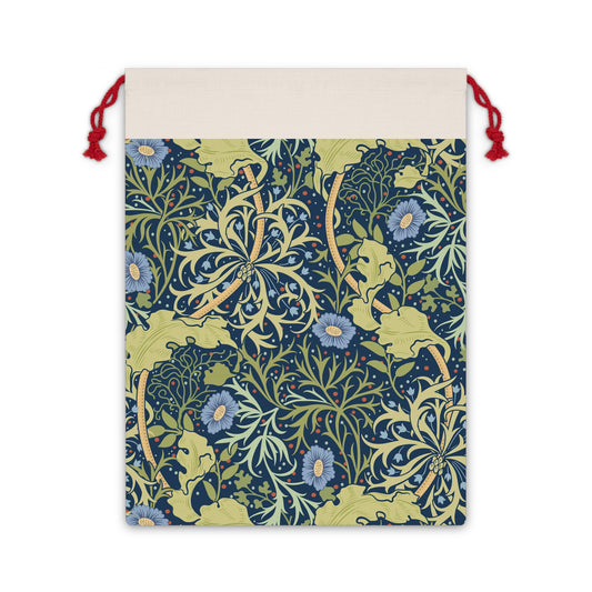 A rectangular linen Christmas gift bag with a blue floral pattern and a polyester drawstring.