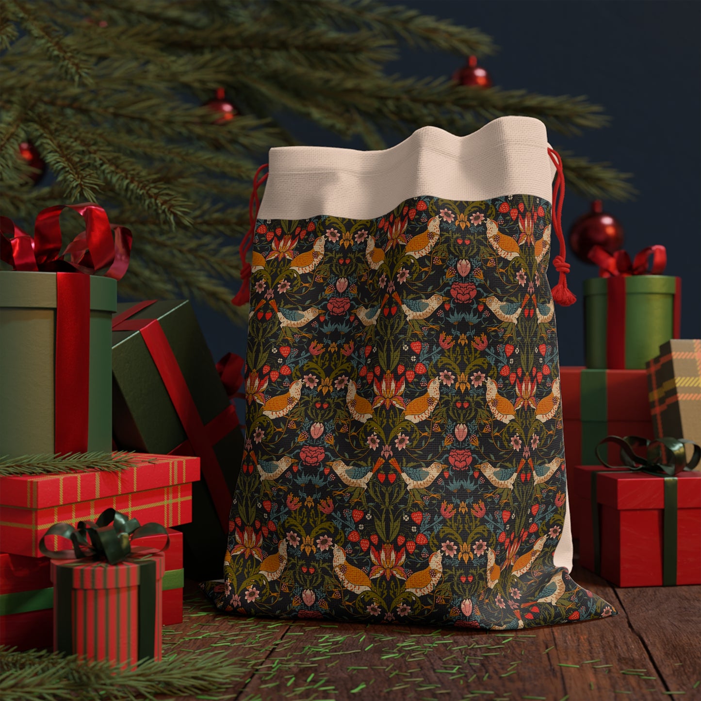 A rectangular Christmas Santa Sack with a floral pattern inspired by William Morris, featuring birds and flowers in a repeat design, with red drawstrings.