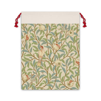 A Christmas Santa sack with a parchment colour, featuring a bird and pomegranate design inspired by William Morris & Co.
