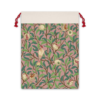 A rectangular Christmas Santa Sack with a pattern of birds and pomegranates in red, green, and beige colours, and red drawstrings.
