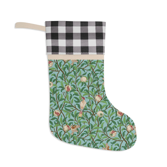 A one-sided print Christmas stocking with a bird and pomegranate design, featuring a black and white checkered top cuff and a tiffany blue colour scheme.