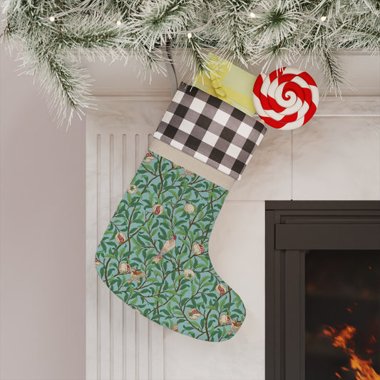 A one-sided print Christmas stocking with a bird and pomegranate design, featuring a black and white checkered top cuff and a tiffany blue colour scheme.