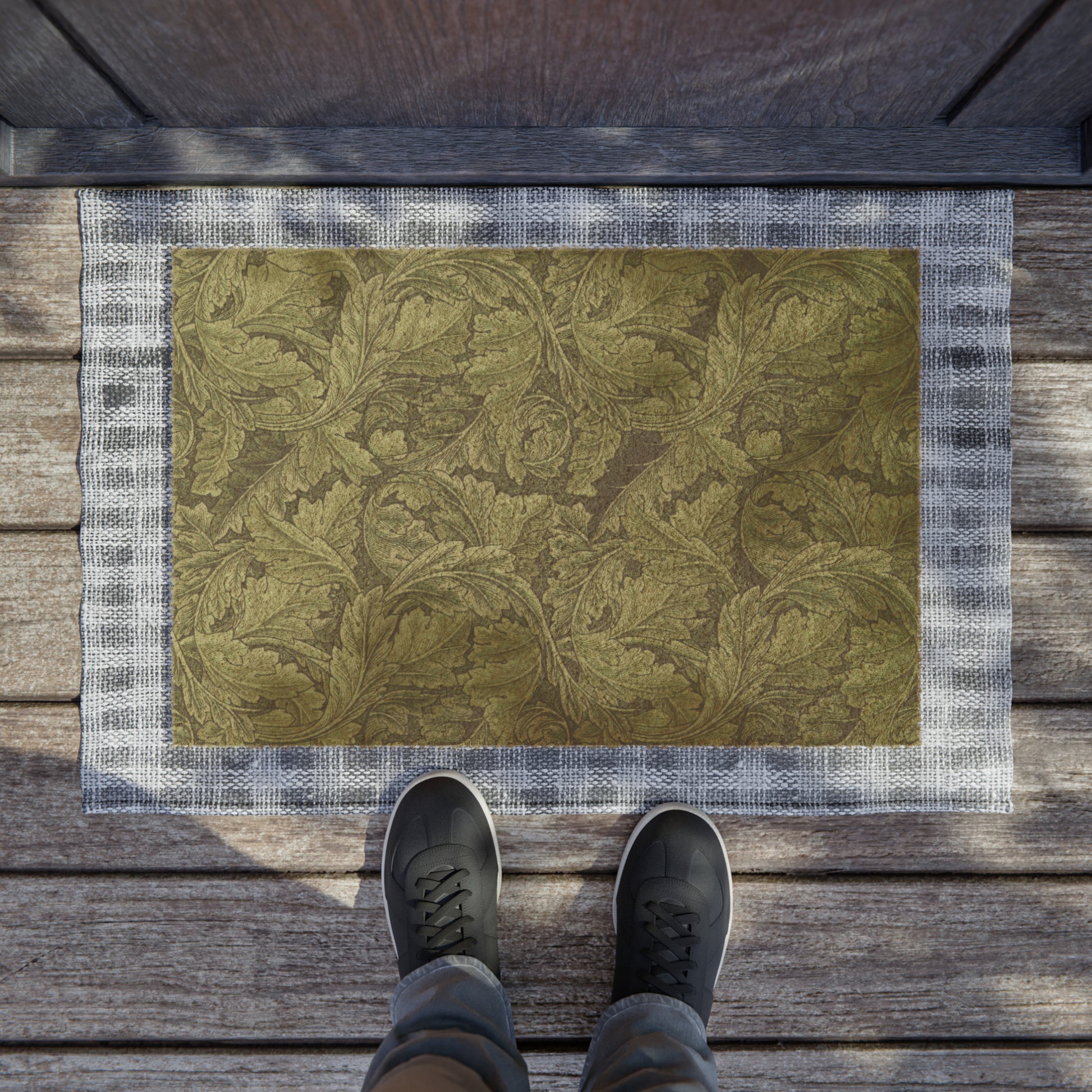 A rectangular green doormat with a floral pattern inspired by William Morris - Acanthus Collection.