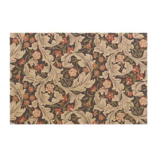 A rectangular coconut coir doormat with a floral pattern inspired by William Morris, featuring a mix of brown, beige, and green colours.