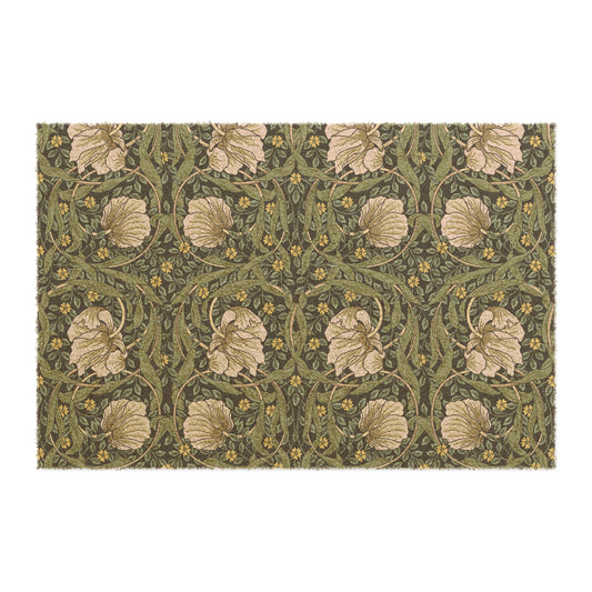 A rectangular green coconut coir doormat with an intricate floral pattern inspired by William Morris's designs, featuring a tufted coir coconut fiber texture and a black vinyl backing.