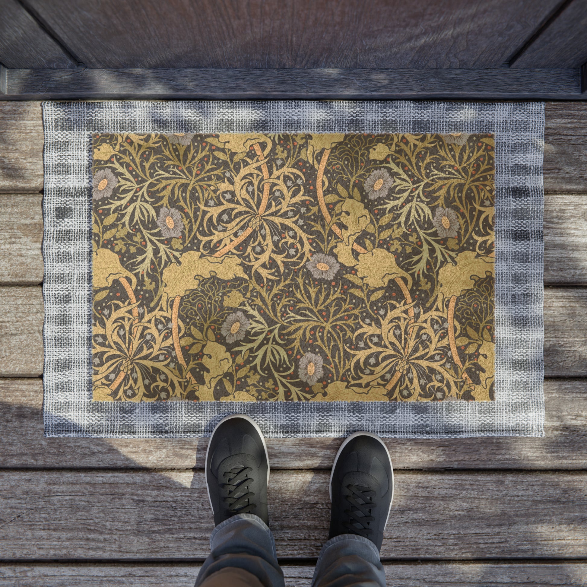 Rectangular coconut coir doormat with a floral William Morris & Co pattern in shades of blue and brown.