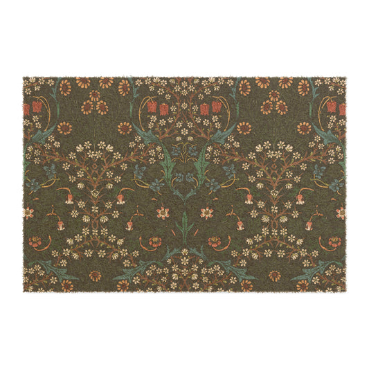 A rectangular doormat with a floral pattern primarily in red, green, and brown colors, featuring a design inspired by William Morris.