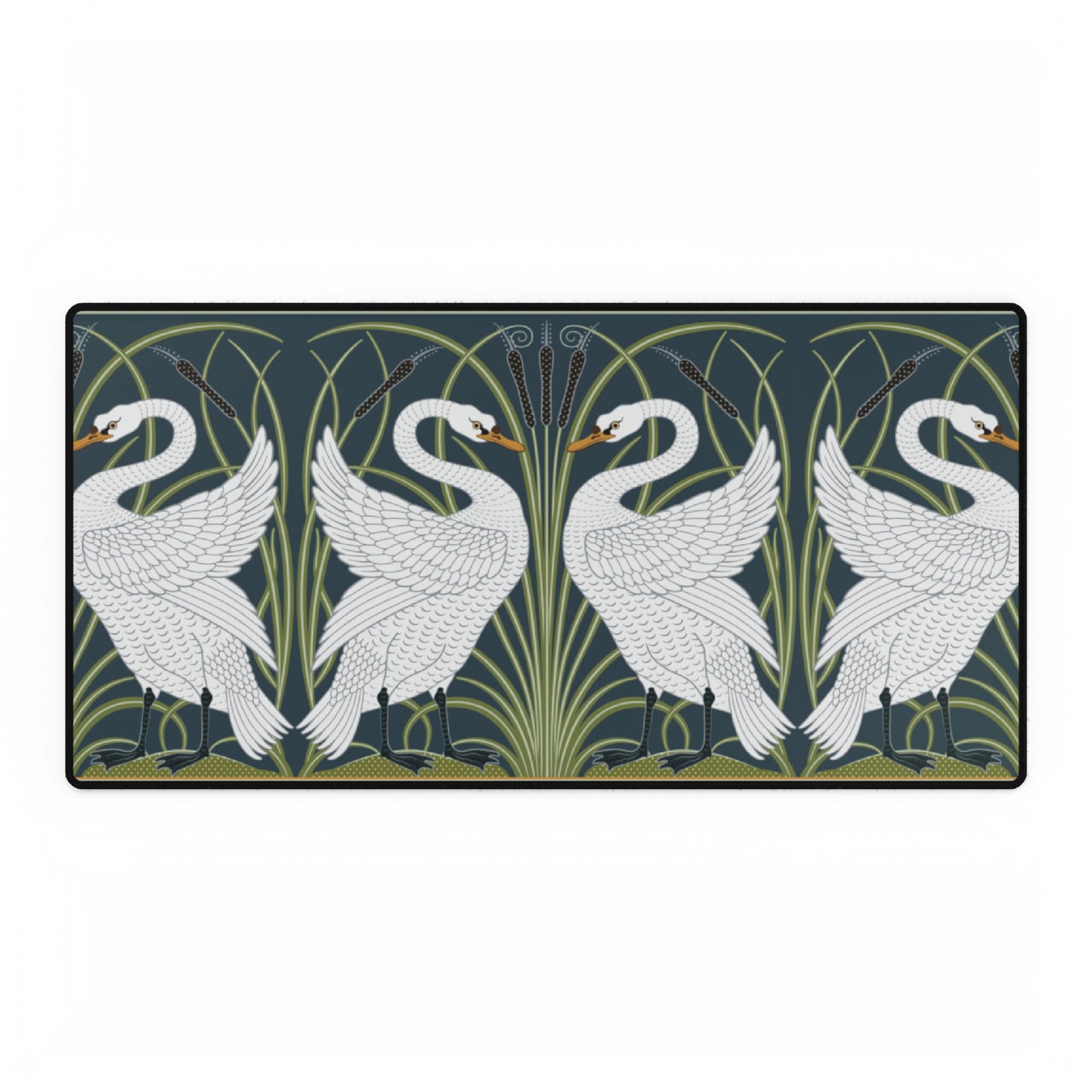 A rectangular desk mat with a floral and swan William Morris & Co pattern design, featuring a white background and swans, placed under a white mouse pad with a keyboard on top.