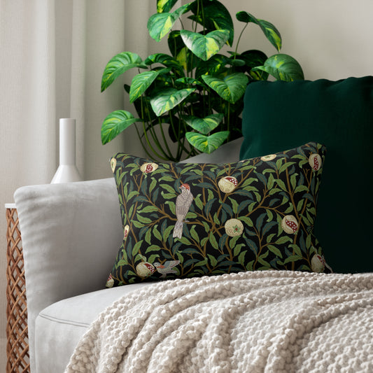 A rectangular William Morris & Co lumbar cushion with a bird and pomegranate design on a green background, featuring a concealed zipper.