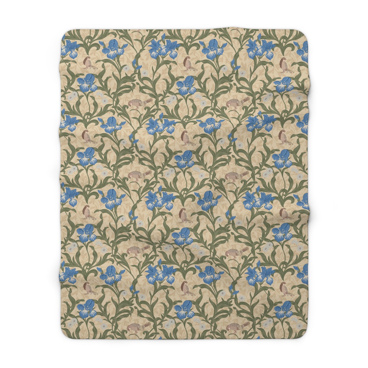 A Sherpa fleece blanket with a floral William Morris & Co pattern in blue and green on a beige background.