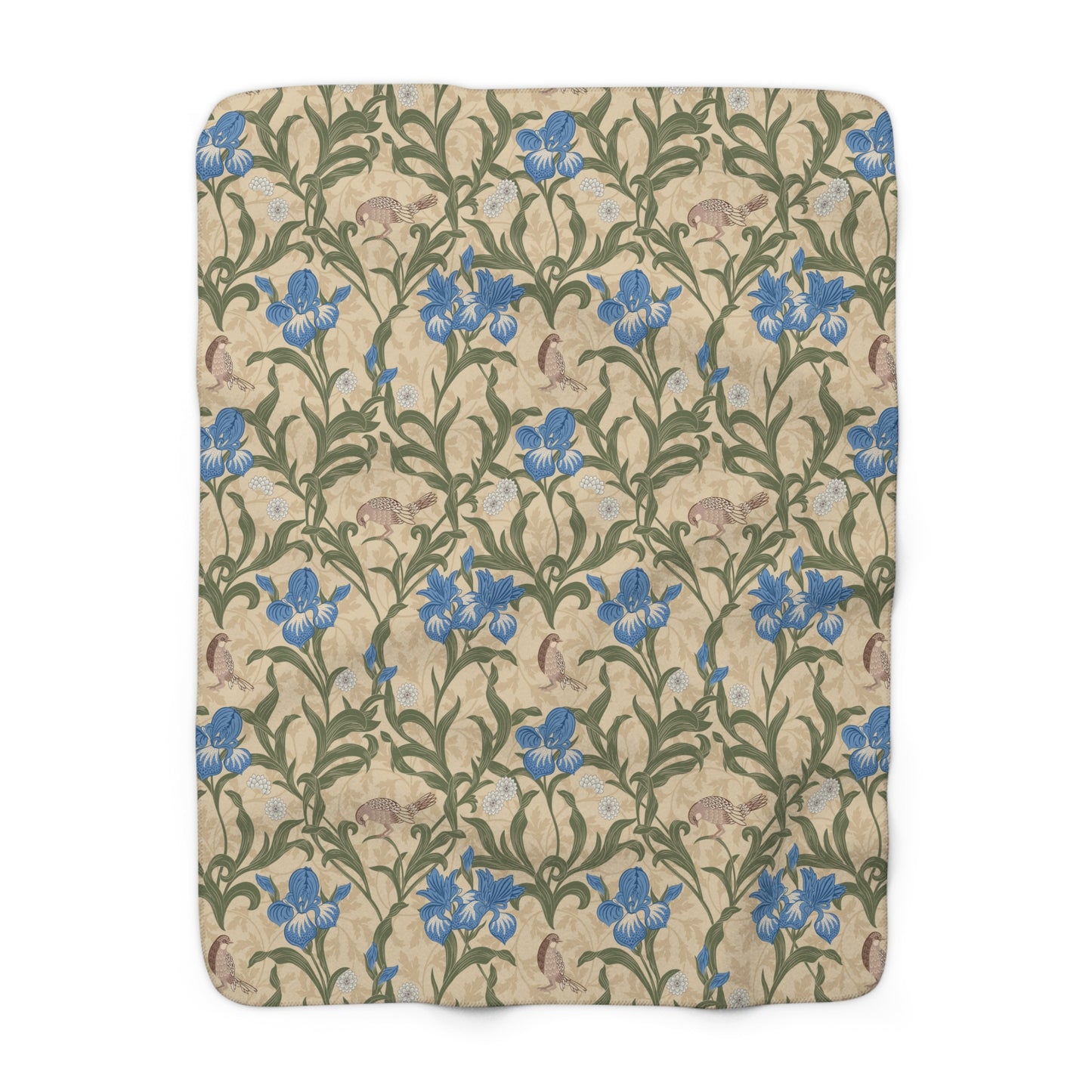 A Sherpa fleece blanket with a floral pattern in blue and green on a beige background.