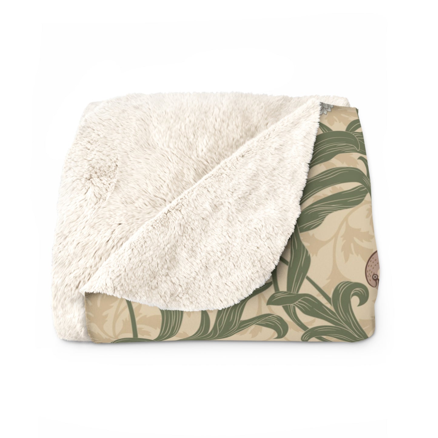 A Sherpa fleece blanket with a floral William Morris & Co pattern in blue and green on a beige background.
