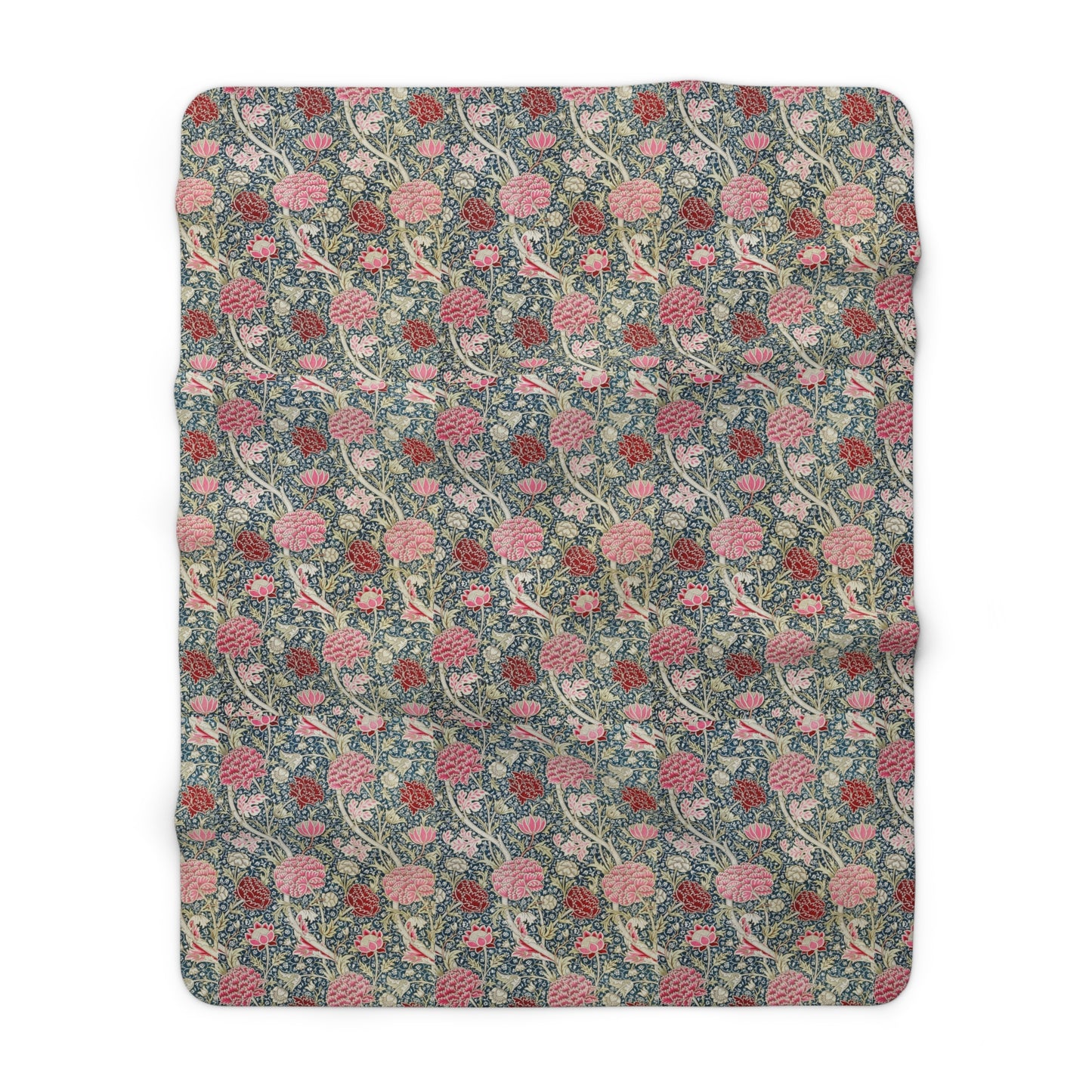 A cozy fluffy fleece blanket with a floral William Morris & Co pattern in various colours, laid flat.