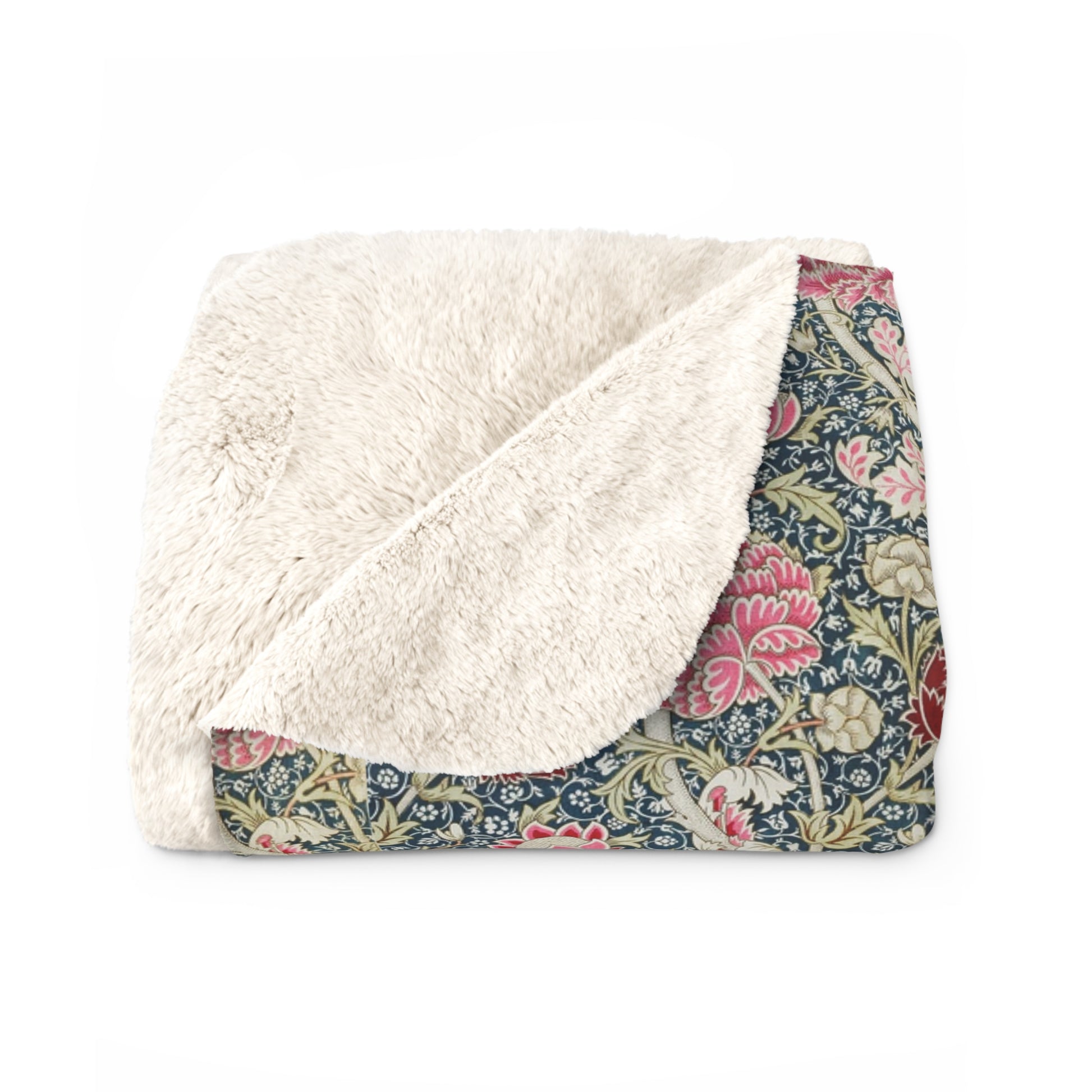 A cozy fluffy fleece blanket with a floral pattern in various colors, laid flat.
