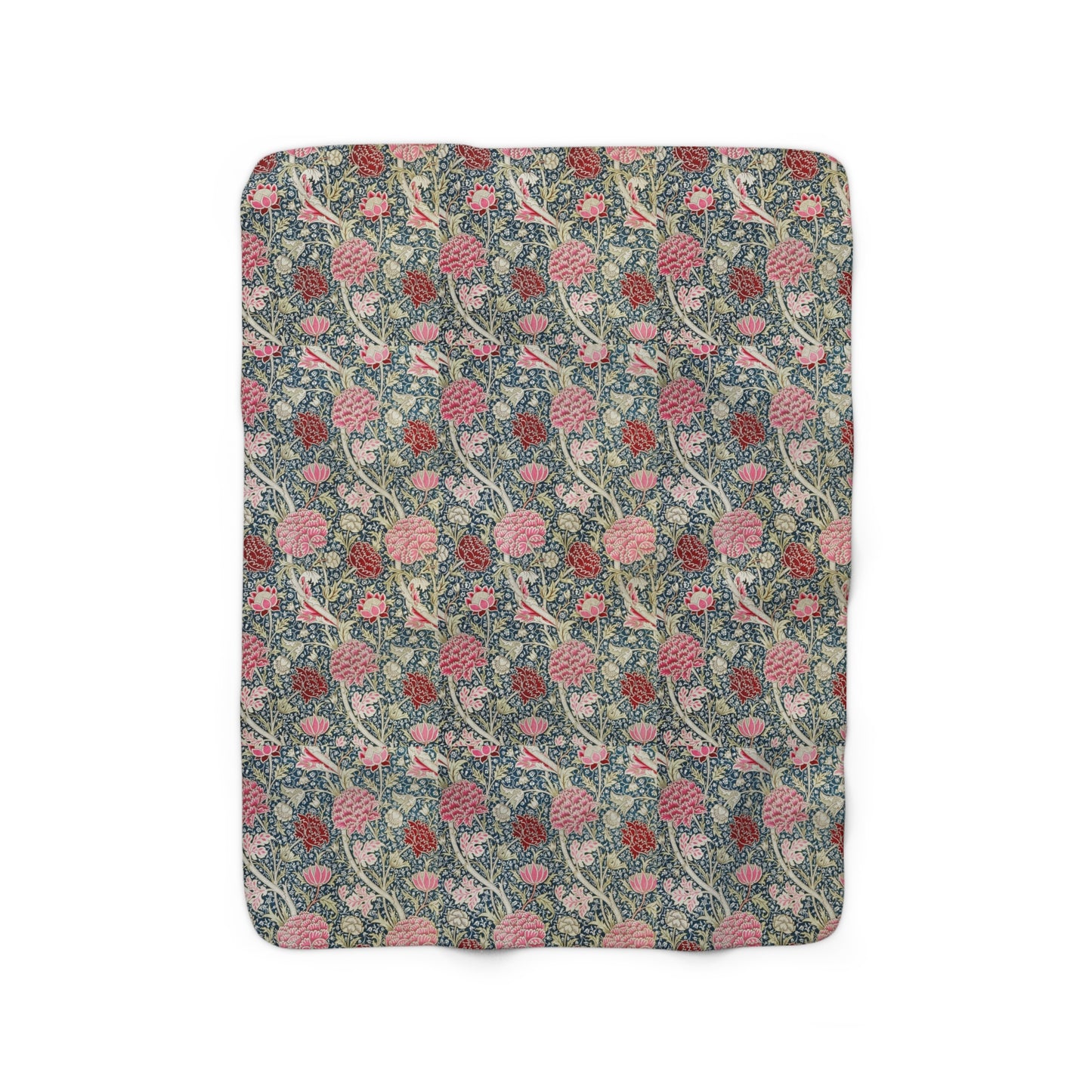 A cozy fluffy fleece blanket with a floral William Morris & Co pattern in various colours, laid flat.