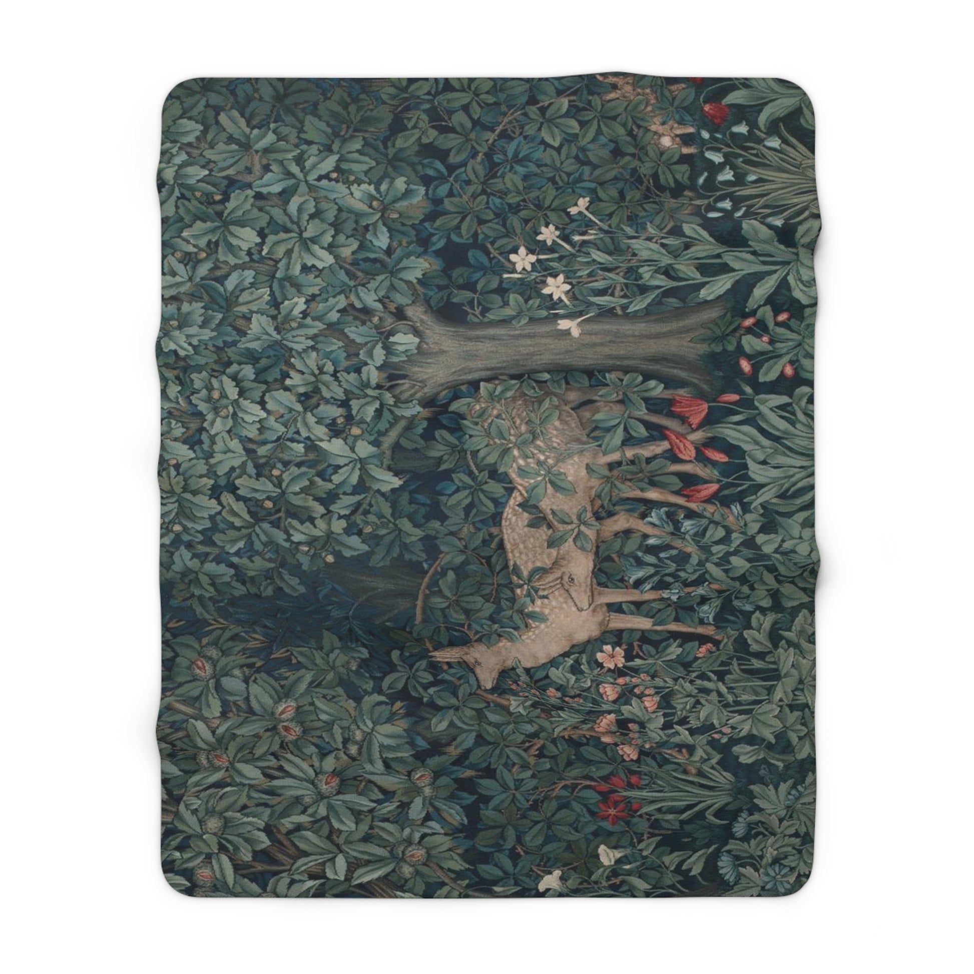 A Sherpa fleece blanket with an intricate floral and tree design, primarily in green and red tones, reflecting a natural and rustic theme.