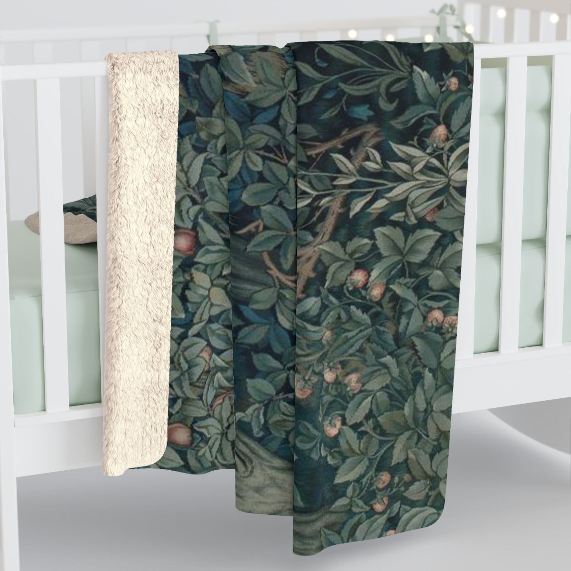 A Sherpa fleece blanket with an embroidered design featuring greenery and a fox, inspired by the William Morris - Greenery Collection.