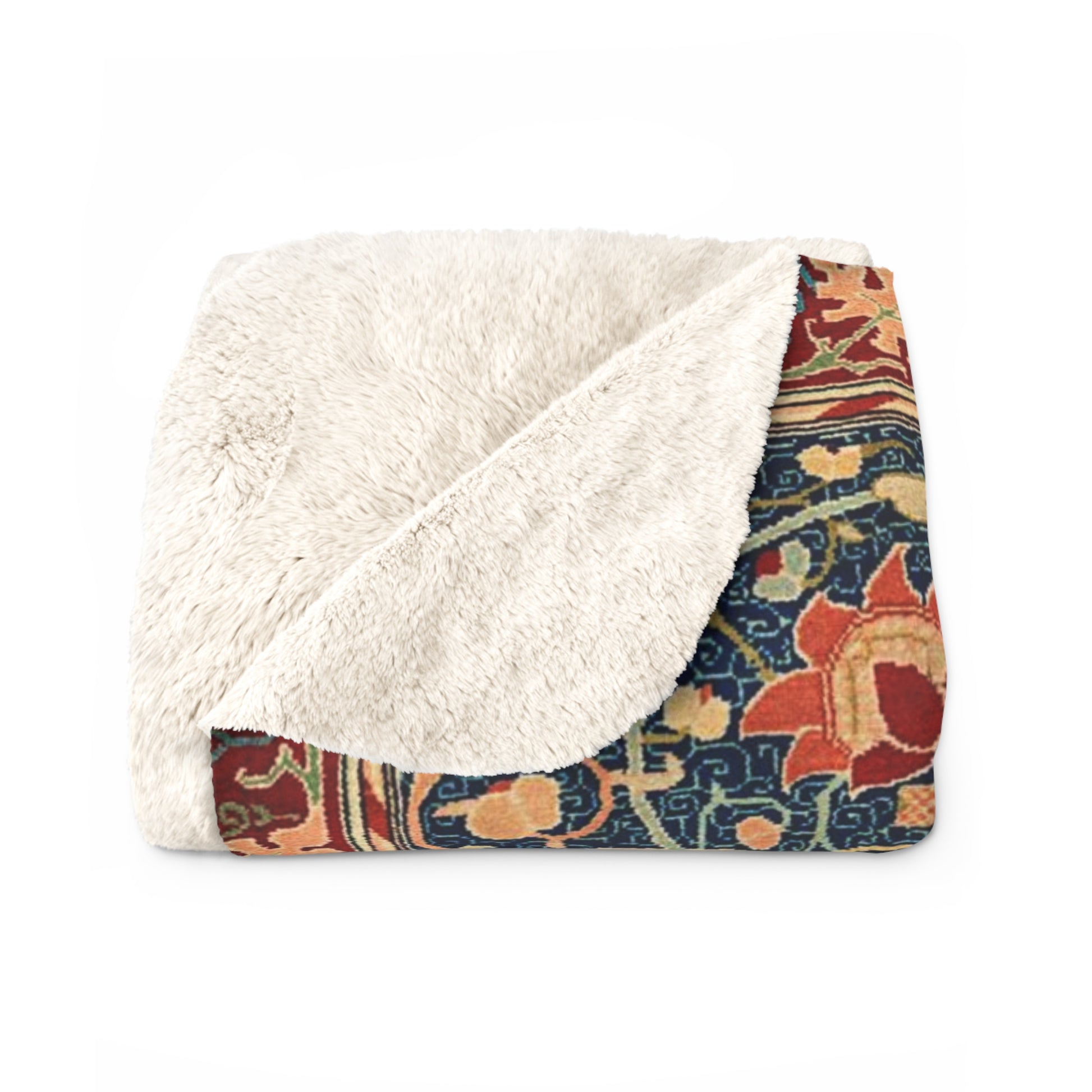 A Sherpa fleece blanket with a geometric and floral pattern in a multicolour William Morris & Co print.