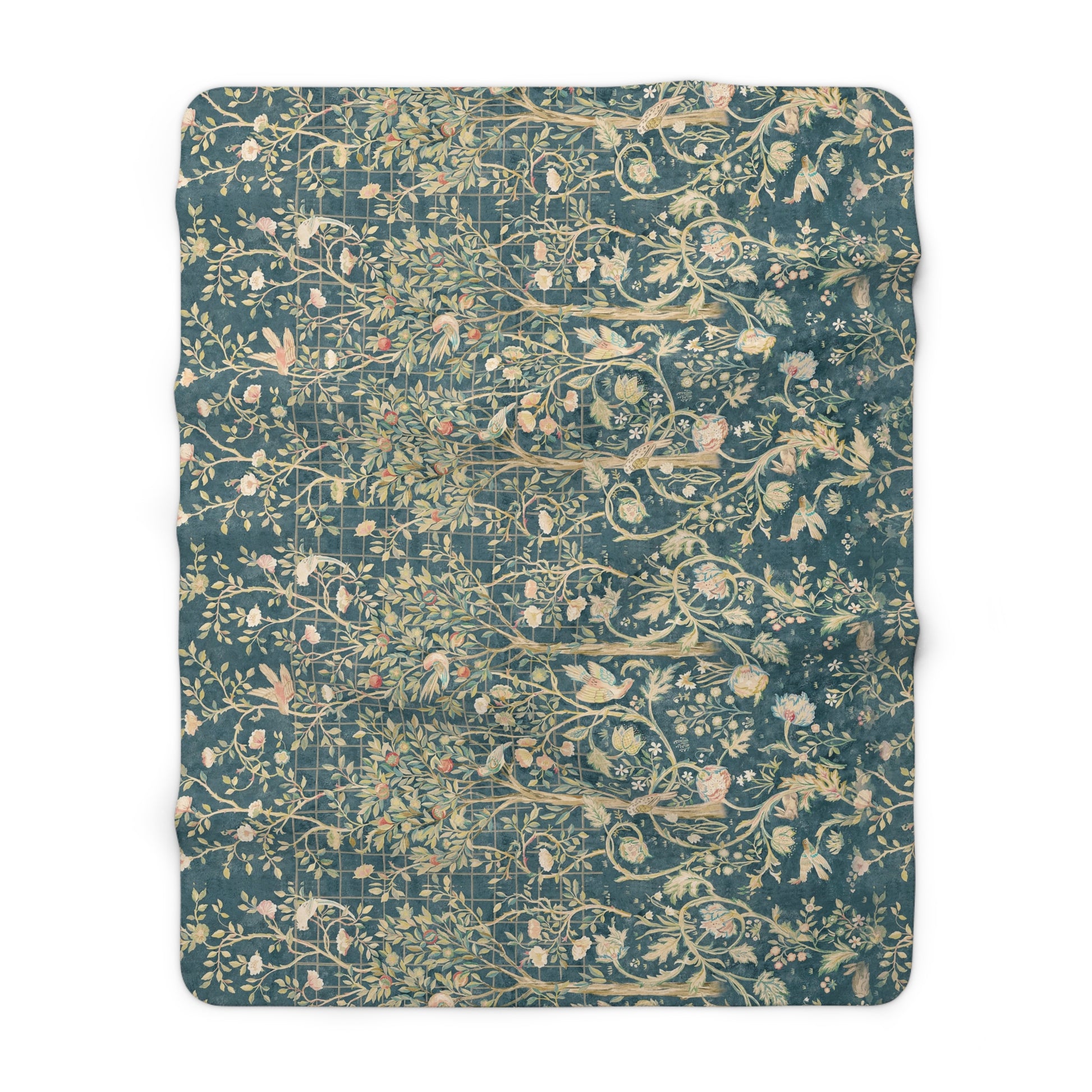 A Sherpa fleece blanket with an all-over floral William Morris & Co pattern in various colours, predominantly teal and cream.