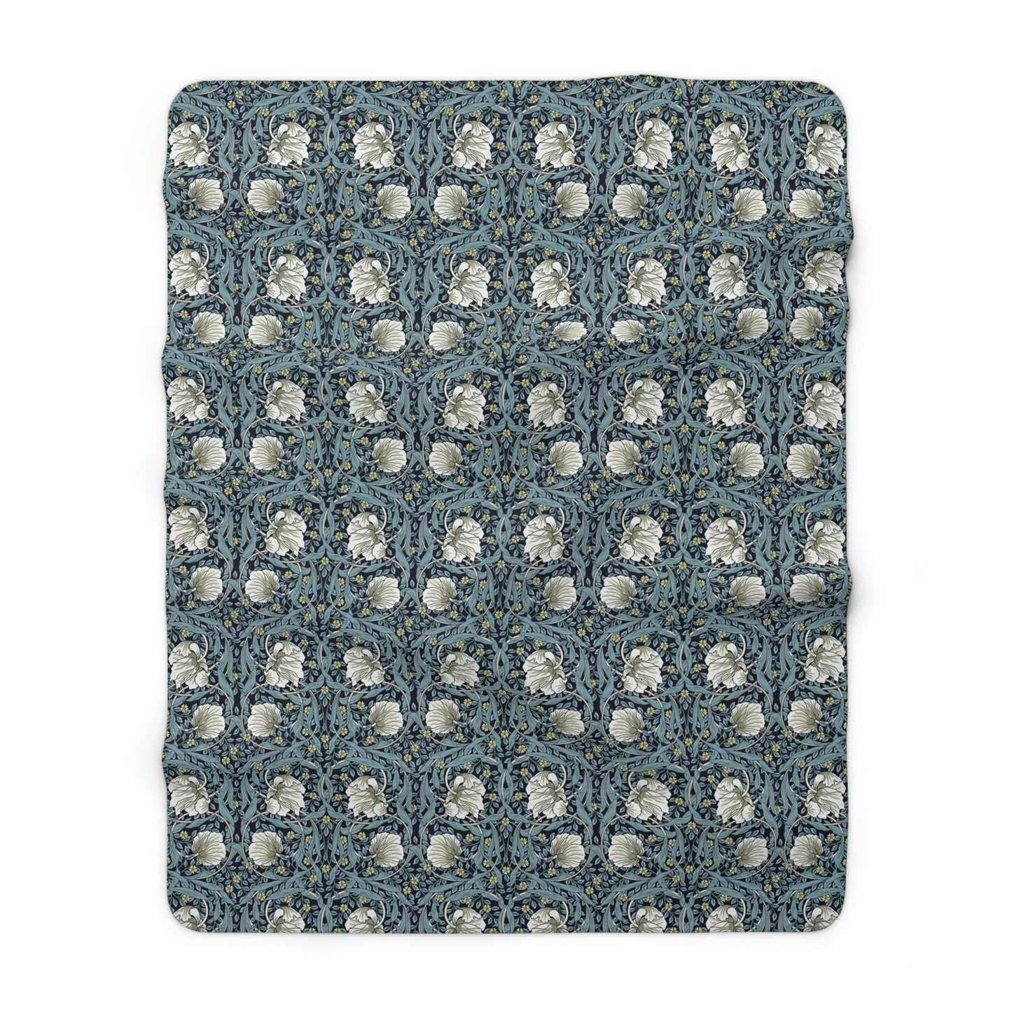 A plush fleece blanket with a geometric William Morris & Co pattern in a slate blue colour, featuring a dense, cozy texture.