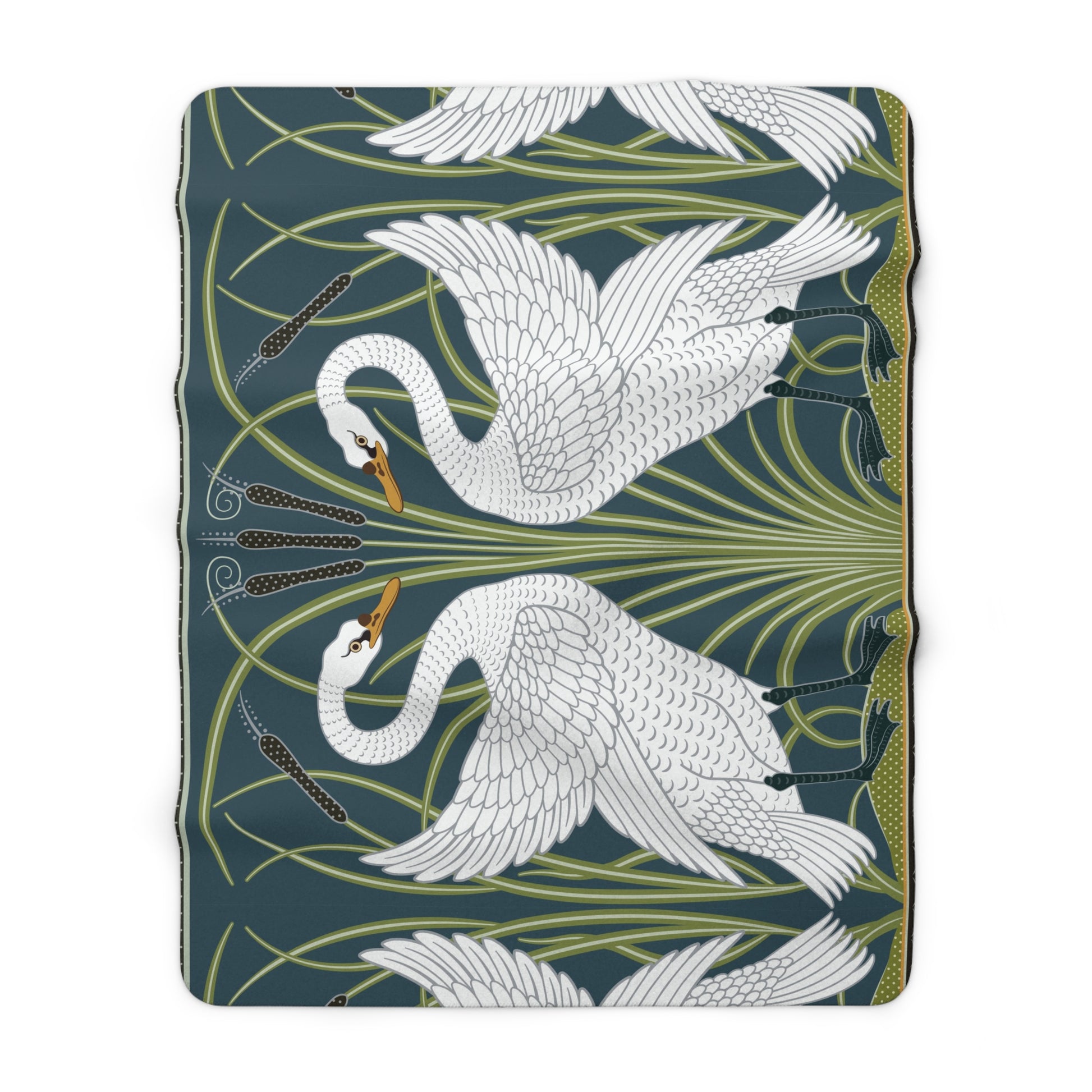 A Sherpa fleece blanket with a floral and swan William Morris & Co pattern in white and green colours on a dark background.