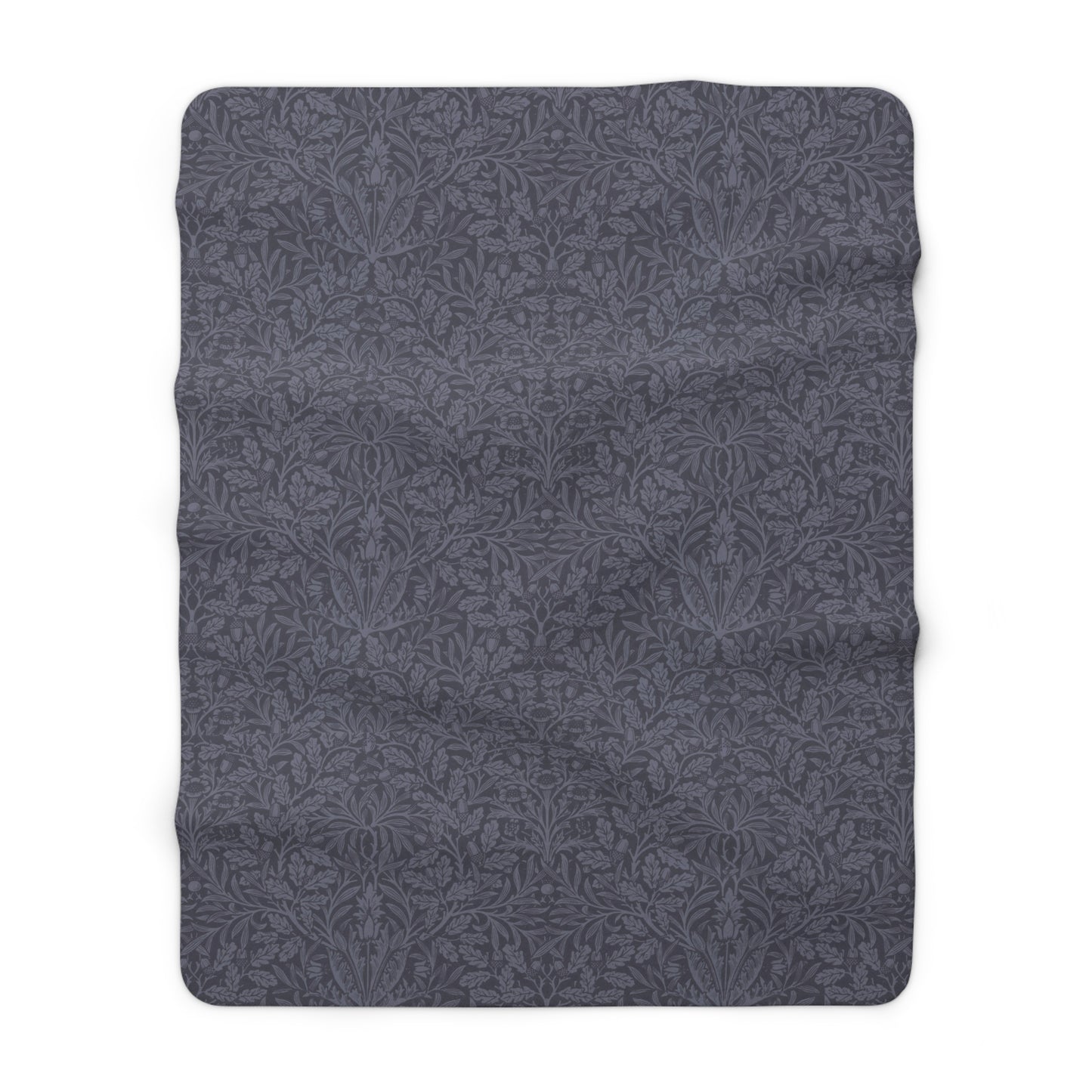 A smoky blue Sherpa fleece blanket with a floral pattern, made inspired by William Morris' Acorn and Oak Leaves collection.