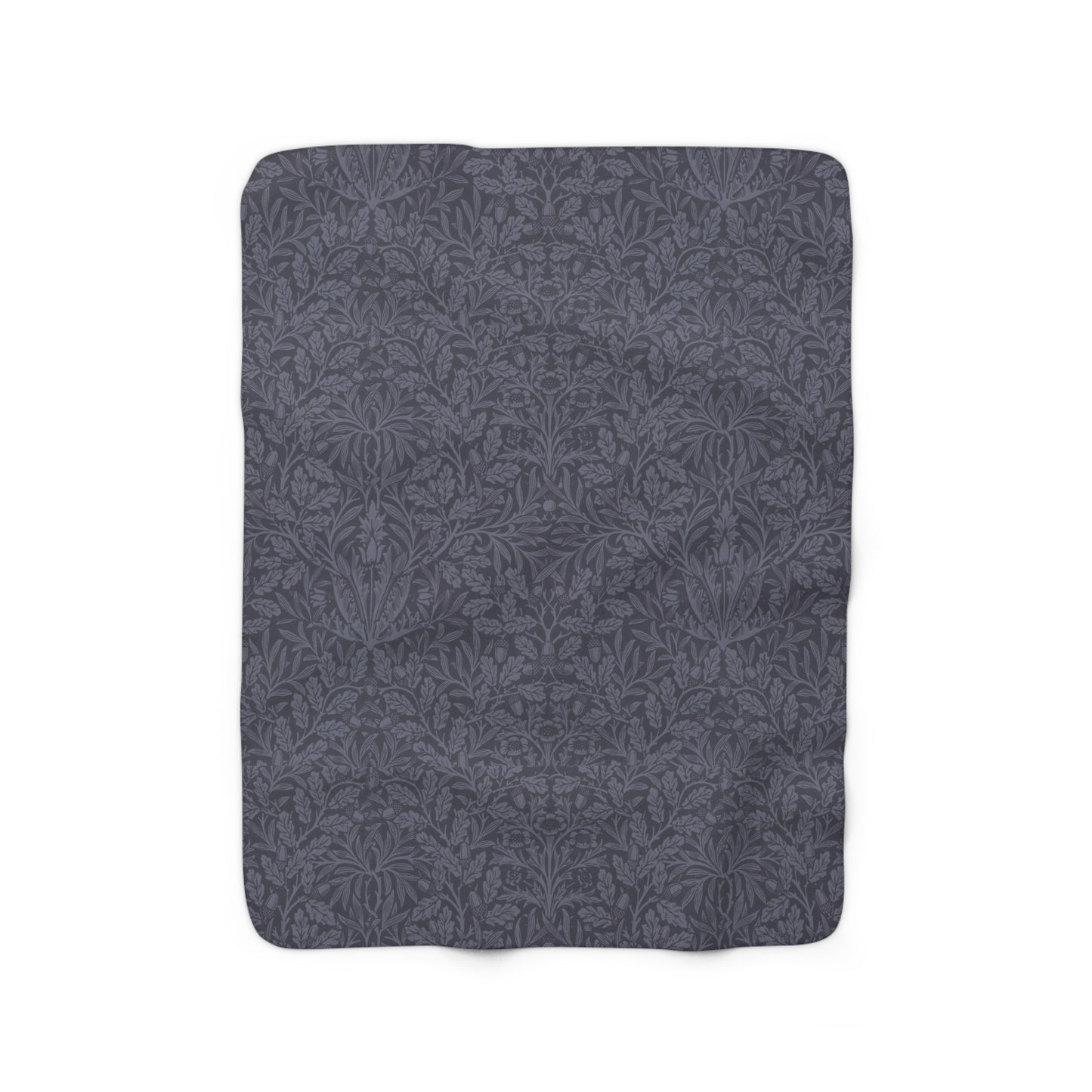 A smoky blue Sherpa fleece blanket with a floral pattern, made inspired by William Morris' Acorn and Oak Leaves collection.