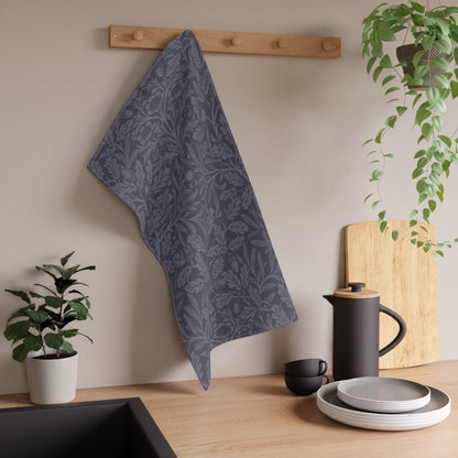 A smoky blue kitchen tea towel with a floral and leaf pattern inspired by William Morris - Acorn and Oak Leaves Collection.