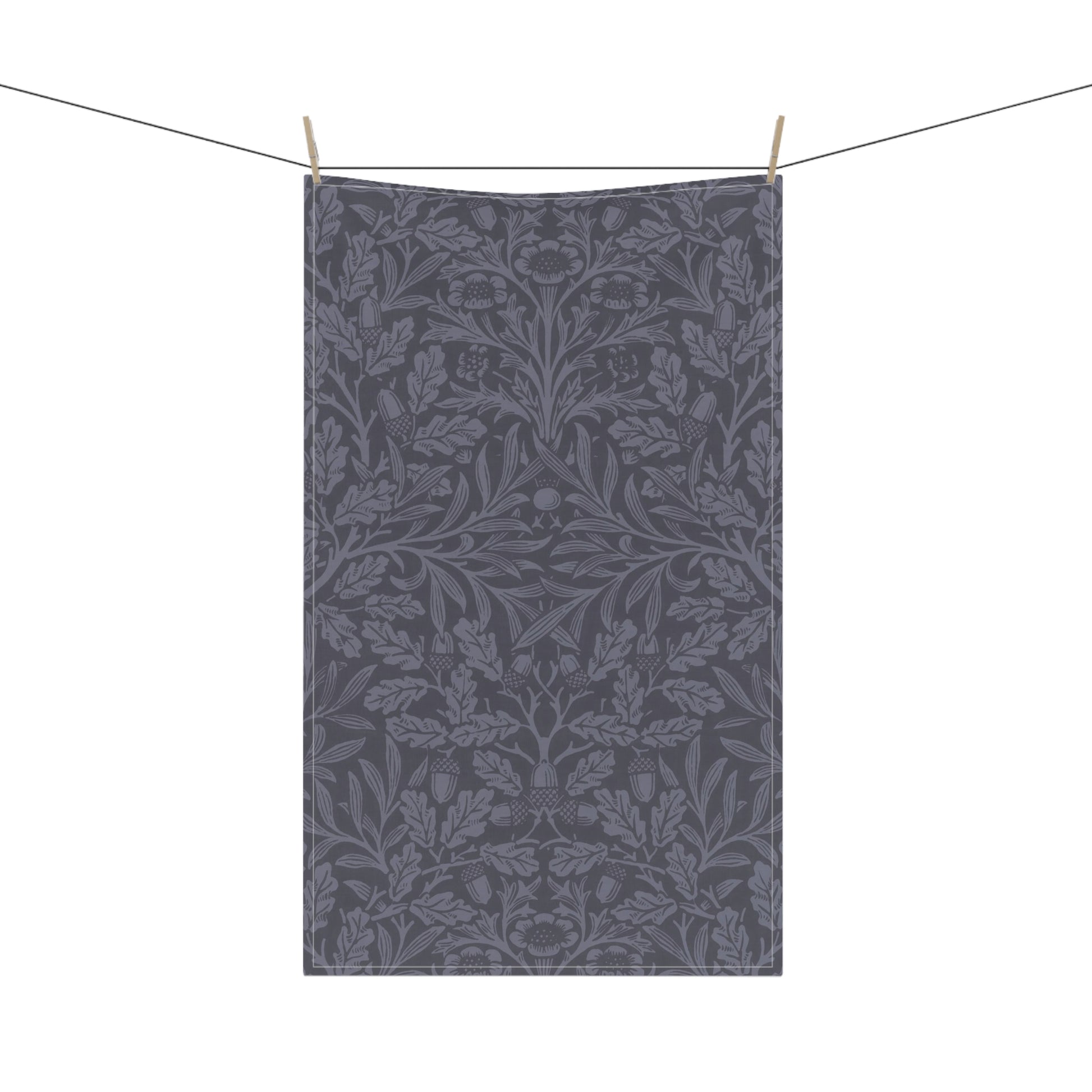 A smoky blue kitchen tea towel with a floral and leaf pattern inspired by William Morris - Acorn and Oak Leaves Collection.